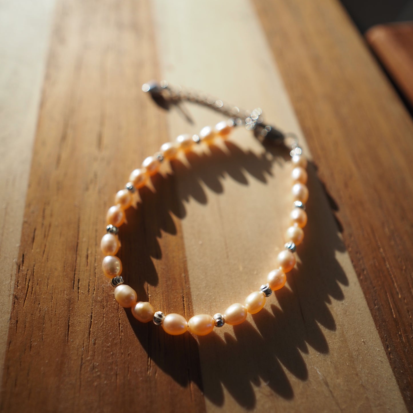 Natural Pinky Orange High Luster Bead Freshwater Pearls Bracelet, Silver Plated